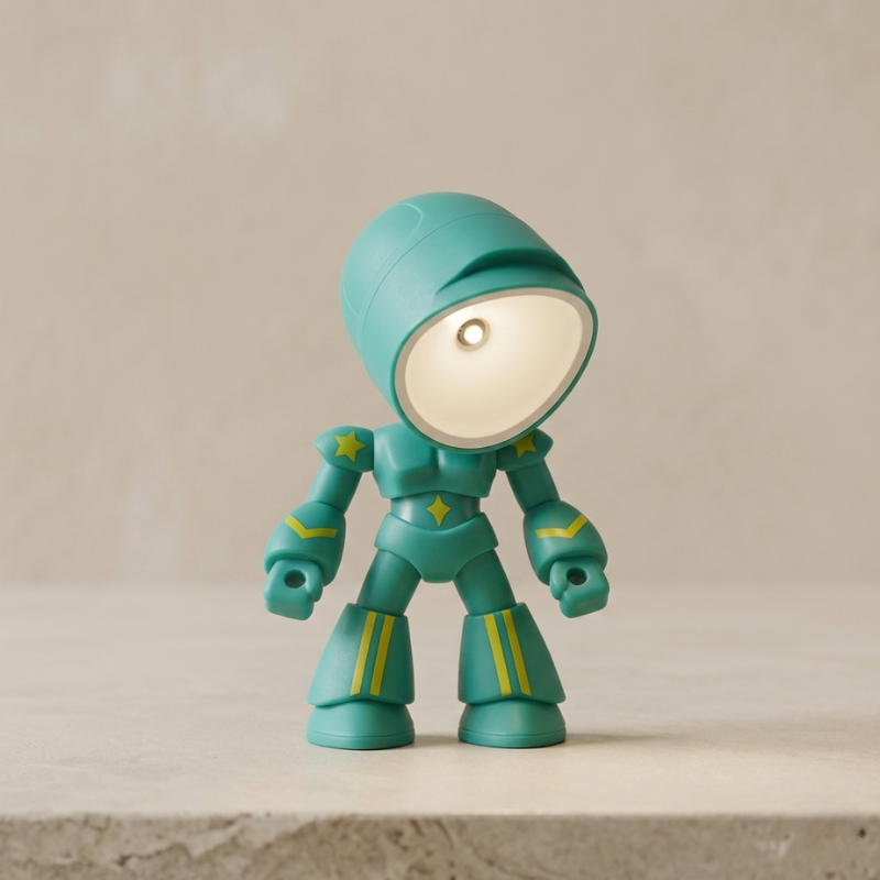 Turquoise robot toy with a white face on a beige background